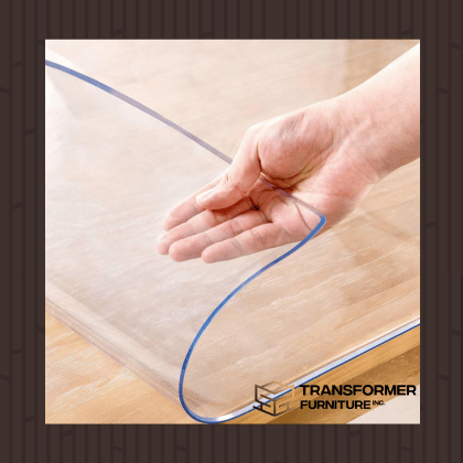 Protective clear cover being applied on a wooden surface - Transformer Furniture Inc.