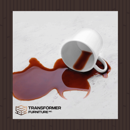 spilled coffee from a white coffee cup on a table, transformer furniture inc. logo