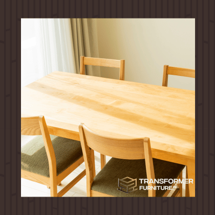 dining table with 4 chairs in a sunny room, curtains on the left, and transformer furniture inc. logo